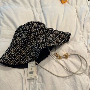 Chenille Monogram Bucket Hat. New with tags. One size fits all. Black and Gold.